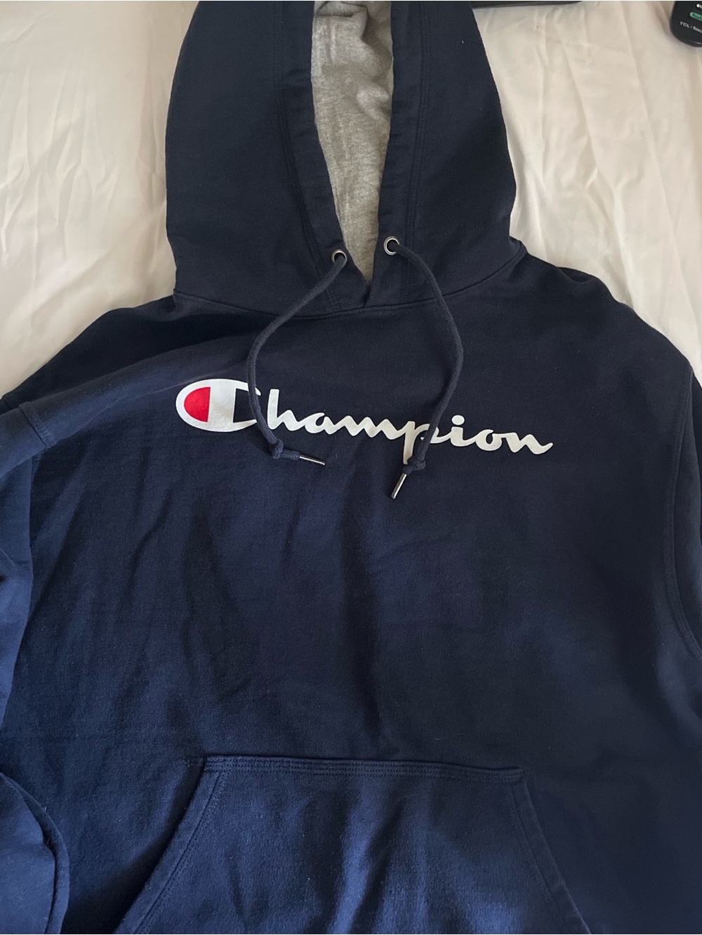 Champion Navy Hoodie with Gray Lining and Script Logo